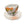 Decorative ceramic tea cup ornament with a floral orange and white design, displayed on a matching saucer marked Charleston Tea Garden